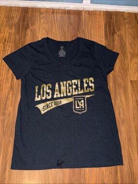 Unk Black V-Neck Tee with Gold Text